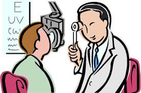 Doctor checking eyes