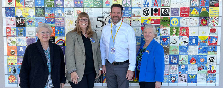 Board Members and Dr. Johnson at Holder tile wall