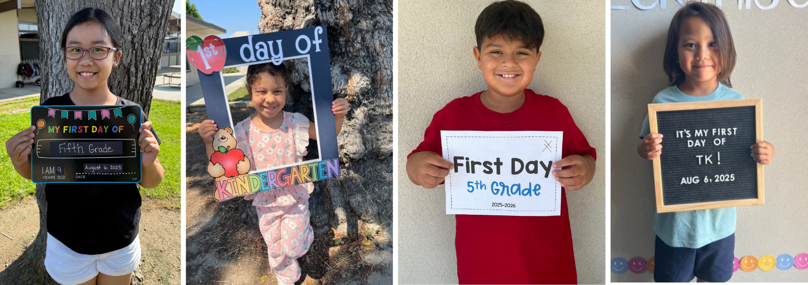 students with first day of school signs